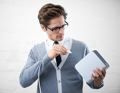 Buy stock photo Man, job and hard drives for storage space, geek and cables for computer, working and young. Technician, excited and laughing with corporate clothes, fashionable and glasses for technology computing