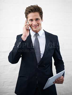 Buy stock photo Business man, phone call and tablet with smile, portrait or contact for networking by wall background. Entrepreneur, employee or person with digital touchscreen, smartphone and happy for notification