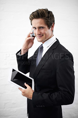 Buy stock photo Business man, phone call and happy with tablet, portrait or contact for networking by wall background. Entrepreneur, employee or person with digital touchscreen, smartphone and smile for notification