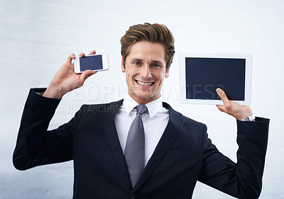 Buy stock photo Business man, tablet and phone screen in portrait, smile and mock up space for promotion by white background. Entrepreneur, person and happy employee with blank smartphone, touchscreen and ux for app