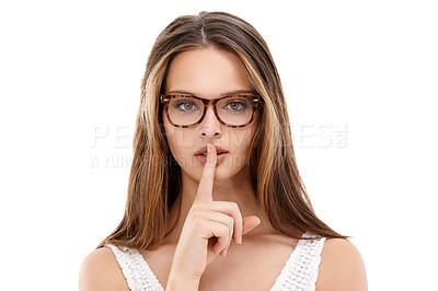 Buy stock photo Secret, portrait and woman with glasses, lips and finger in studio, isolated white background and privacy. Face, female model and silence gesture on mouth for quiet, shush hands and gossip to whisper