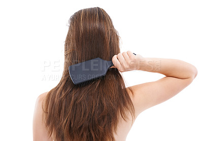 Buy stock photo Hair, brush and back of woman on a white background for wellness, keratin treatment and healthy hair. Beauty salon, hair products and girl brushing for shine, growth and hair care isolated in studio