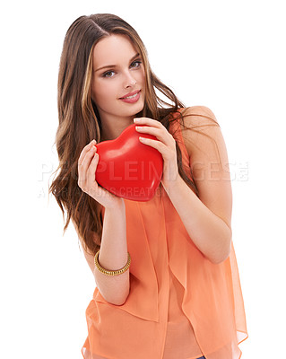 Buy stock photo Portrait, heart and love with a woman in studio on a white background holding an emoji, icon or shape. Red, romantic and valentines day with a young female holding a symbol or romance in her hands
