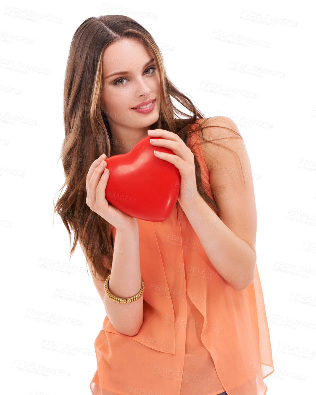 Buy stock photo Portrait, heart and love with a woman in studio on a white background holding an emoji, icon or shape. Red, romantic and valentines day with a young female holding a symbol or romance in her hands