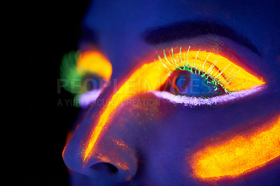 Buy stock photo Eyes, art and creative with neon woman on black background in studio for bright vision or fantasy. Face, future and psychedelic with model in dark for galaxy or universe paint on glowing skin closeup
