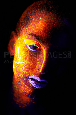 Buy stock photo Portrait, fantasy and creative with neon woman on black background for makeup, glitter or colorful glow. Face, art and beauty with confident young person in the dark for psychedelic or techno paint