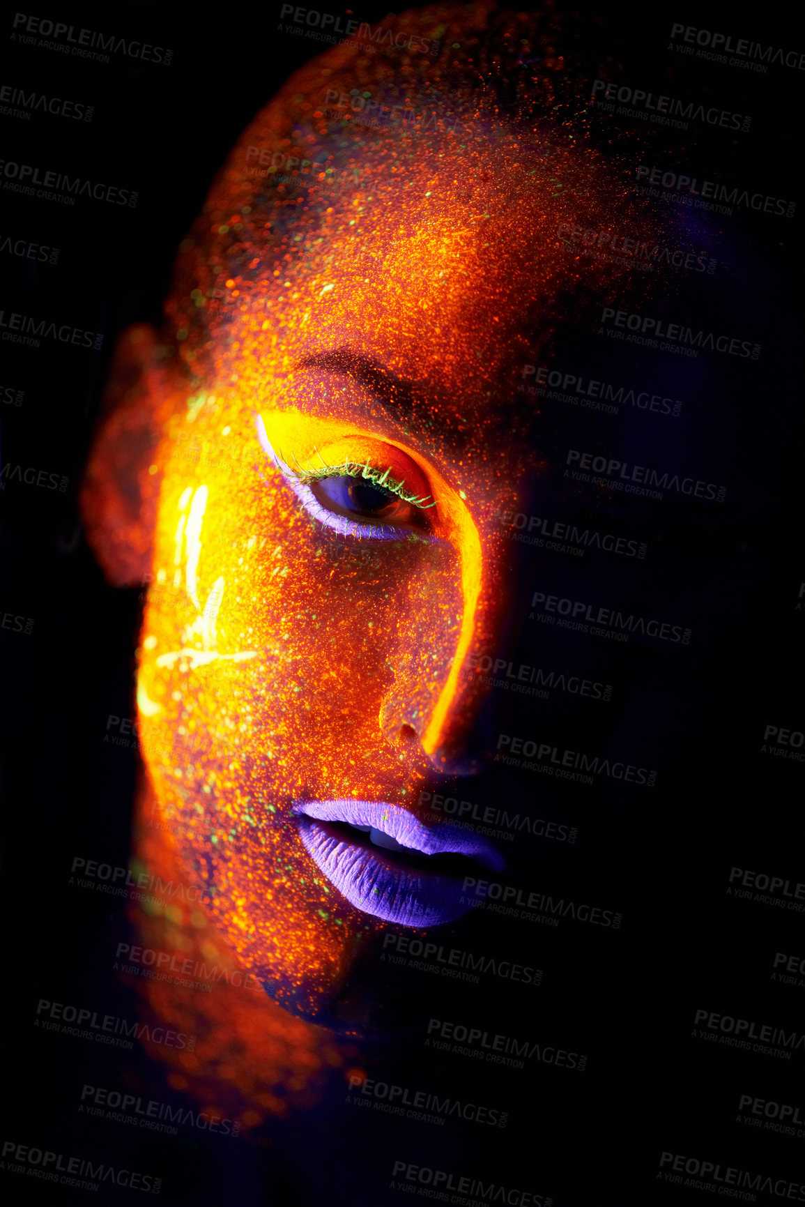 Buy stock photo Portrait, fantasy and creative with neon woman on black background for makeup, glitter or colorful glow. Face, art and beauty with confident young person in the dark for psychedelic or techno paint