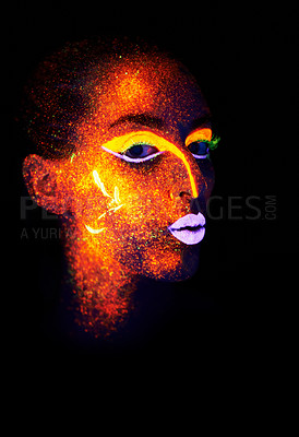 Buy stock photo Portrait, beauty and creative with neon woman on black background for makeup, glitter or colorful glow. Face, fantasy and art with confident young person in the dark for psychedelic or techno paint