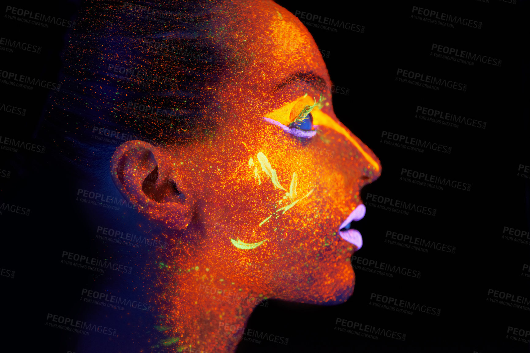 Buy stock photo Art, woman and profile with neon paint on face and beauty, bright lipstick and creative skincare on dark background. Orange glow, disco aesthetic and model in studio for creativity with makeup