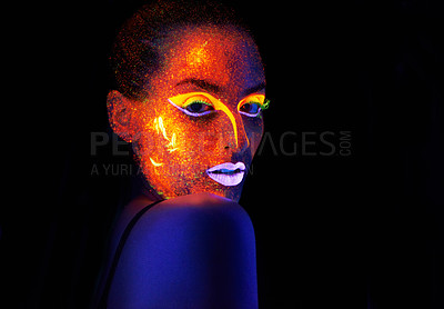 Buy stock photo Portrait, art and creative with neon woman on black background for makeup, glitter or colorful glow. Face, fantasy and beauty with confident young person in the dark for psychedelic or techno paint