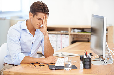 Buy stock photo Businessman, headache and stress on computer in mistake, burnout or fatigue at the office. Frustrated man or employee with migraine in anxiety, mental health or work pressure by PC desk at workplace