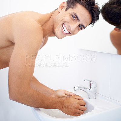 Buy stock photo Man, washing hands and portrait for hygiene in mirror, clean and protection from germs. Male person, bathroom and wellness in morning routine, reflection and grooming or self care and basin at home