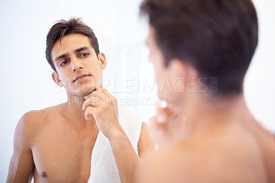 Buy stock photo Man, grooming and towel after washing face in mirror, cleaning and skincare or beauty. Male person, bathroom and wellness in morning routine, reflection and hygiene or self care and shaving at home