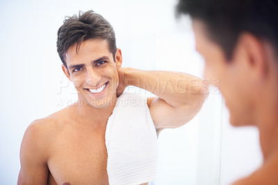 Buy stock photo A handsome man smiling after shaving