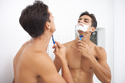 Buy stock photo Man, shaving cream and razor in mirror for hair removal in bathroom, beauty and wellness. Male person, skincare and cosmetics or foam for cleaning in morning routine, grooming and reflection at home