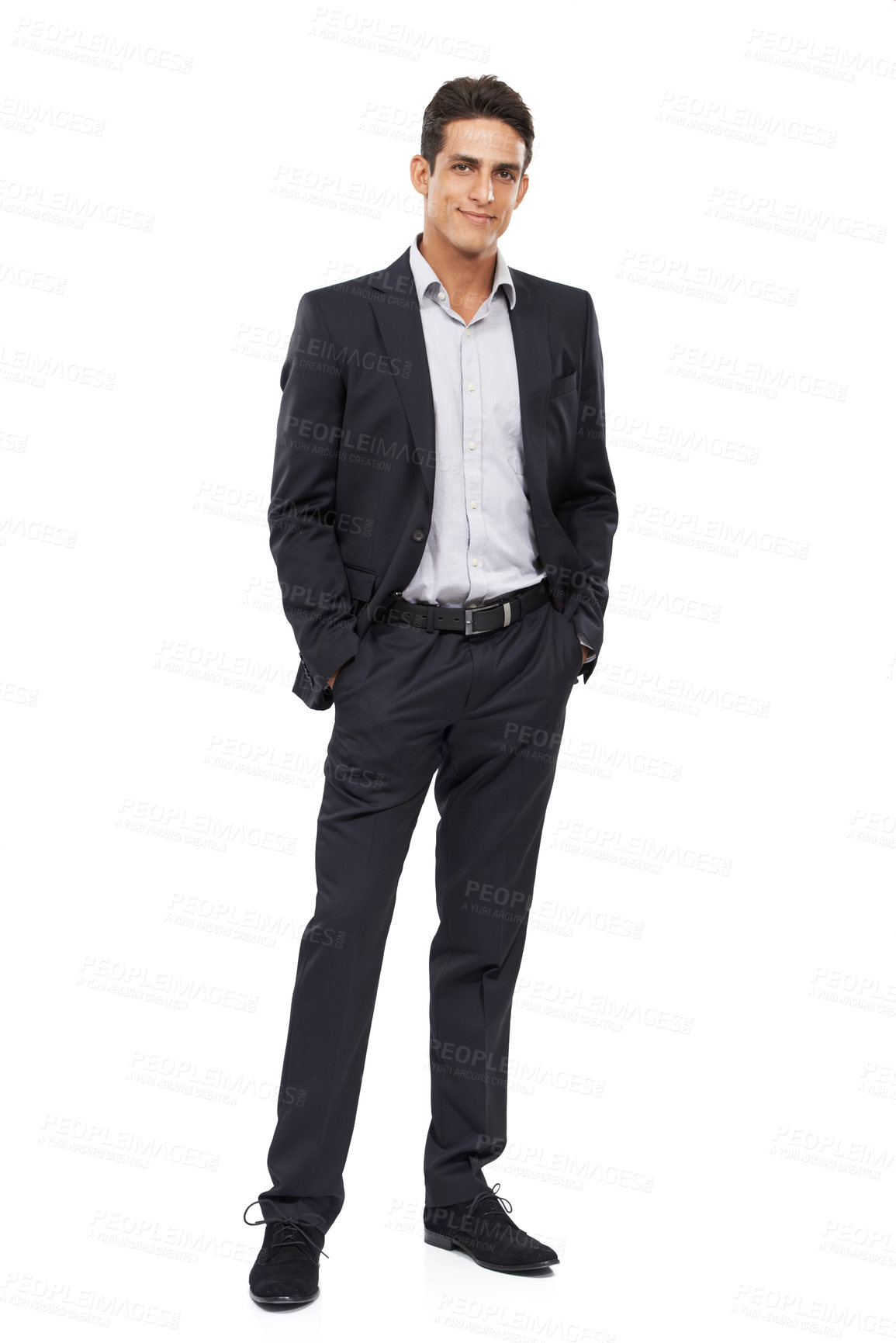 Buy stock photo Full length portrait of a confident young businessman standing with his hands in his pockets