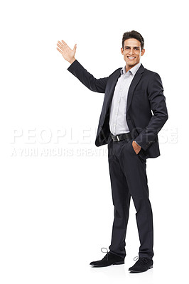 Buy stock photo Full length portrait of a handsome young businessman presenting your copyspace