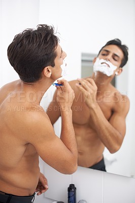 Buy stock photo Man, shaving cream and blade in mirror for hair removal in bathroom, beauty and wellness. Male person, skincare and cosmetics or cleaning in morning routine, grooming and razor in reflection at home
