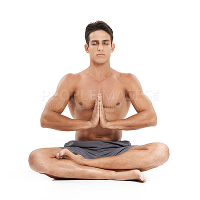Buy stock photo Man, meditation and yoga in studio for mindfulness or spiritual awareness, zen and namaste pose. Male person, pilates and peace or wellness and healing or relax, fitness and calm by white background