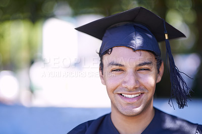 Buy stock photo Portrait of a smiling graduate man