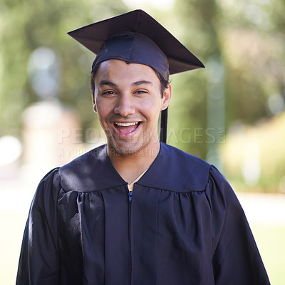 Buy stock photo Portrait of a happy graduate male