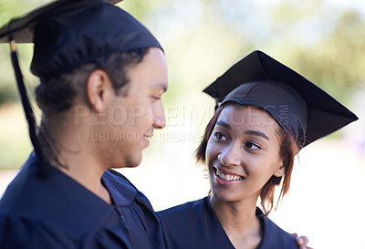 Buy stock photo Couple, graduation with education and academic success with ceremony outdoor at university. Certification, achievement and event at college with happy people together for milestone and award