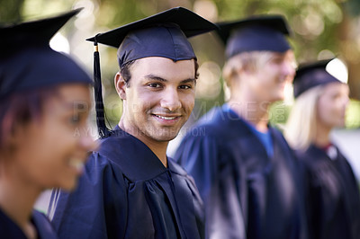Buy stock photo Happy man, portrait and student in outdoor graduation for education, learning or qualification. Male person, group or graduate smile for higher certificate, diploma or degree in nature or ceremony