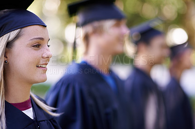 Buy stock photo Woman, graduate and university achievement for education with ceremony outdoor. Certified, smile and graduation event for academic success, higher learning and certification with pride and profile