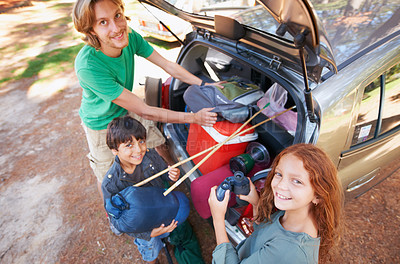Buy stock photo Happy family, portrait and packing car for road trip, holiday or camping vacation together in nature. Top view of father and children with smile for summer camp adventure, weekend or travel in forest