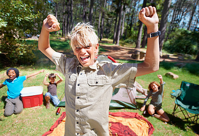 Buy stock photo Happy boy, portrait or camping success in forest celebration for winning or goal on holiday vacation. Woods, hands up or excited children with smile for victory, kids or wellness in nature or park