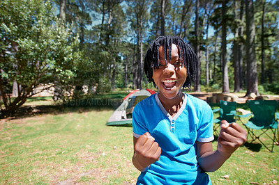 Buy stock photo Child, portrait and excited for camping adventure in outdoors, happy and relaxing on vacation or holiday. Black male person, kid and face or confident in park, childhood and summer or freedom on lawn