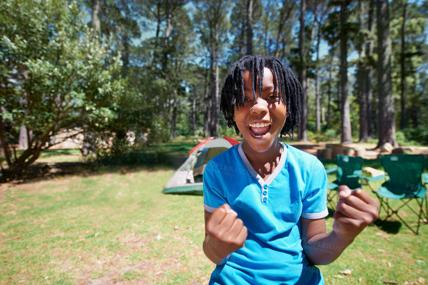 Buy stock photo Child, portrait and excited for camping adventure in outdoors, happy and relaxing on vacation or holiday. Black male person, kid and face or confident in park, childhood and summer or freedom on lawn