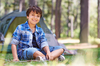 Buy stock photo Forest camping or portrait of happy child in nature for playing, adventure or holiday vacation in park. Relax, confidence or male kid with smile in woods, garden or grass for fun hiking or wellness