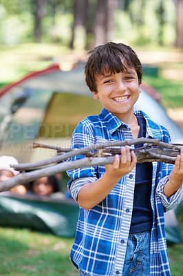 Buy stock photo Wood, camping or portrait of boy in nature for playing, adventure or holiday vacation in park. Relax, confidence or happy male child with smile in woods, garden or forest for fun hiking or wellness