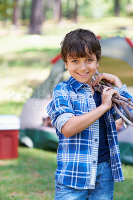 Buy stock photo Wood, camping or portrait of boy in nature for playing, adventure or holiday vacation in park. Relax, collect or happy child with smile or sticks in woods, garden or forest for fun hiking or wellness