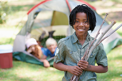Buy stock photo Wood, summer camp or portrait of African kid in nature playing, adventure or holiday vacation in park. Relax, collect or happy child with smile or sticks in woods, garden or forest for fun camping