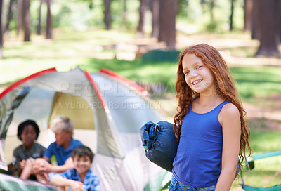 Buy stock photo Sleeping bag, camping or portrait of happy girl in woods on adventure or holiday vacation in nature. Relax, start or kid with smile in forest, garden or park ready for fun hiking, travel or wellness