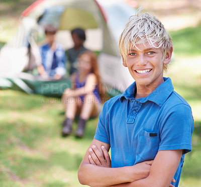 Buy stock photo Kid, portrait and smile at summer camp in outdoors, fun and relaxing on vacation or holiday. Happy male person, child and face or confident in park, childhood and adventure or freedom in nature