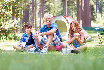 Buy stock photo Camping, children and friends in portrait while outside, bonding and happy for outdoor adventure. Kids, face and eating food together on holiday, vacation and nutrition in nature, relaxing and grass