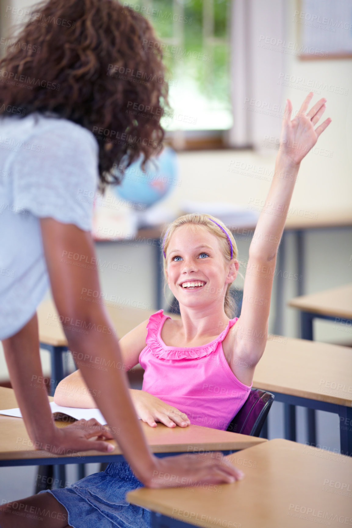 Buy stock photo Teacher, child and raise hand for questions, support and helping with education and teaching in school or classroom. Happy girl or kid with arm up for knowledge, learning and class talking or advice