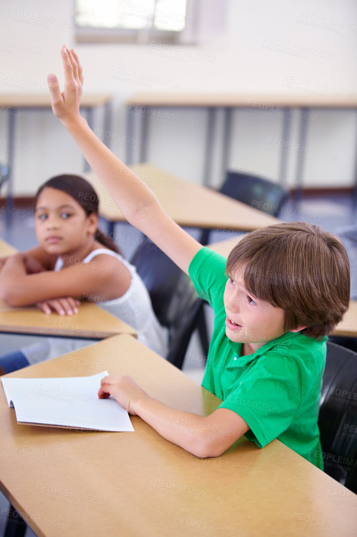 Buy stock photo Child raise his hand in school for questions, support and help with classroom education and teaching in school development. Clever boy or kid with arm up for knowledge, learning and answer or advice