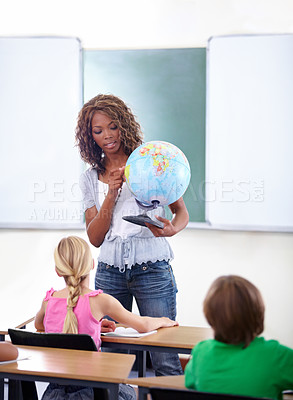 Buy stock photo Geography, woman or teacher with children in classroom for globe education, world learning or earth knowledge. African person, school or kids for teaching global information, planet and map location 