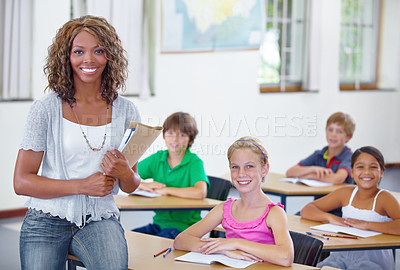 Buy stock photo Woman, teacher and children portrait in classroom for education, learning and knowledge in diversity group. Happy african person with teaching notes, kids or students at desk in class for school