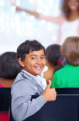 Buy stock photo Happy student, portrait and child with thumbs up in class for winning or success at school. Young male person, boy or kid smile and thank you with like emoji, yes sign or OK for education classroom