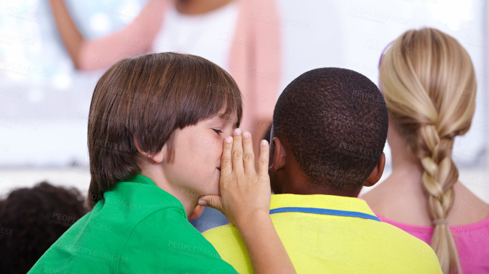 Buy stock photo Children, whisper and classroom in ear for secret, gossip or communication in lesson at school. Person, students or friends listening to rumor, information or eavesdrop in class together with teacher