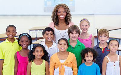 Buy stock photo Class portrait of an elementary school teacher and her pupils