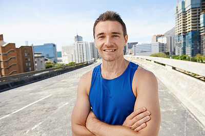 Buy stock photo Happy man, arms crossed in city and fitness outdoor for workout, training and athlete smile in portrait for sports. Confidence, face and exercise on urban bridge, health and wellness in Chicago