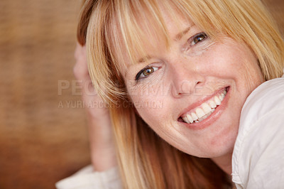 Buy stock photo A beautiful mature woman smiling at the camera
