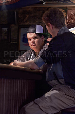 Buy stock photo Friends, beer and console with man at pub for conversation, empathy and alcohol. Sadness, helping and restaurant with people talking at table in bar for discussion, brewery and weekend gathering