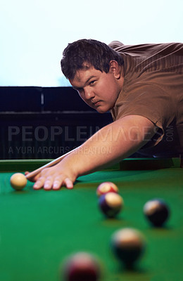 Buy stock photo Man playing pool, game and aim with cue and ball, social event at sports bar or restaurant for contest. Competition, focus and serious player, billiard or snooker with concentration for target in pub